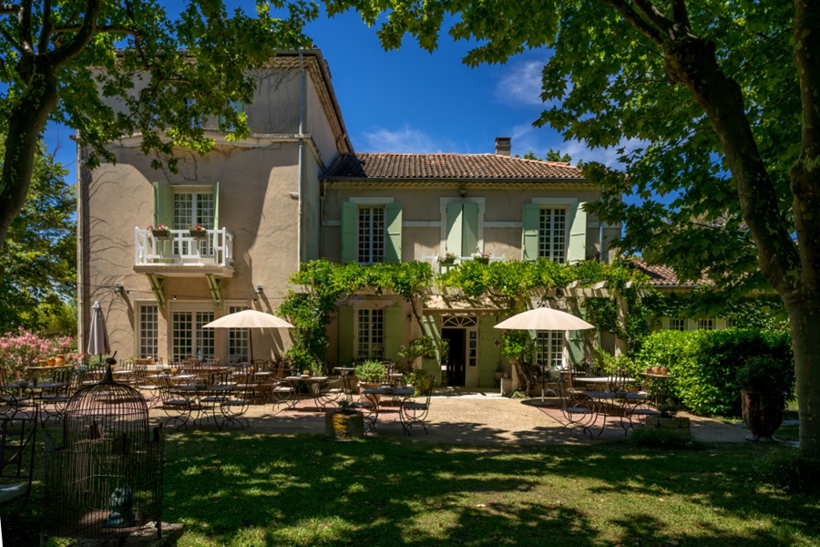The shady garden terrace of Hotel l'Hermitage in Provence France